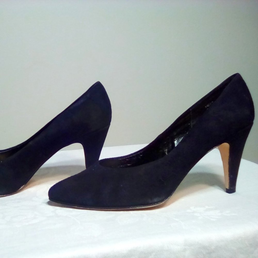 Black suede pumps